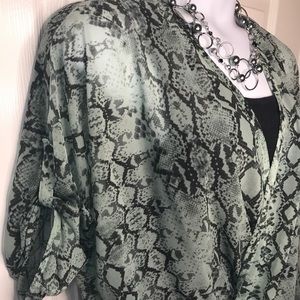 Jennifer Lopez snake skin print sheer blouse